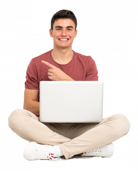 internet-teenager-man-sitting-on-the-flor-with-his-laptop-pointing-to-the-side-to-present-product-dualnet